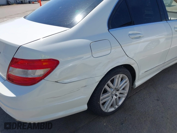 2009 Mercedes-Benz C-Class 3.0L Sport with VIN WDDGF54X09F233877, listed as a IAAI auction lot 42121123 with 215,698 mi miles. Bid and sale history available at carsss.com. Image 6.
