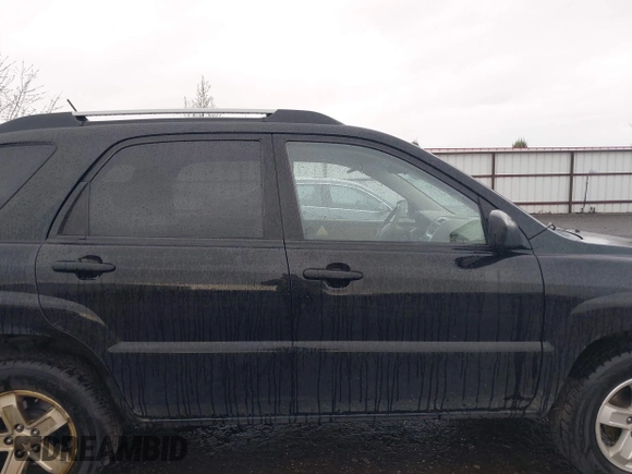 2009 Kia Sportage LX with VIN KNDJE723497612745, listed as a IAAI auction lot 41974301 with 141,110 mi miles and . Bid and sale history available at carsss.com. Image 13.