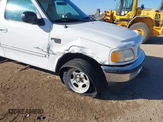 1998 Ford F-150 with VIN 1FTZX17W3WKB43668, listed as a IAAI auction lot 41243322 with 154,780 mi miles and . Bid and sale history available at DreamBid. Image 6.