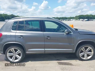2016 Volkswagen Tiguan SE with VIN WVGAV7AX8GW083822, listed as a IAAI auction lot 42529779 with 65,437 mi miles and . Bid and sale history available at DreamBid. Image 14.