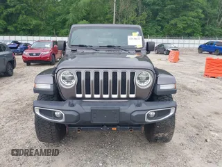 2018 Jeep Wrangler Unlimited Sahara with VIN 1C4HJXEN8JW303023, listed as a IAAI auction lot 42138631 with 72,463 mi miles and . Bid and sale history available at DreamBid. Image 12.