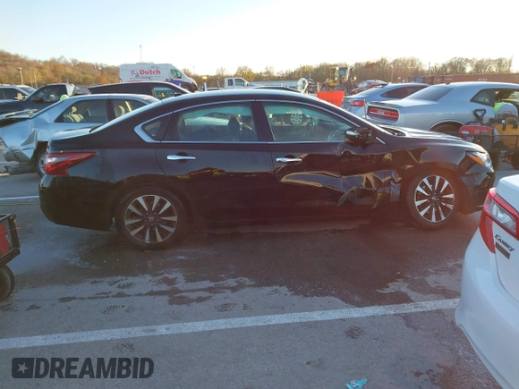 2018 Nissan Altima SR with VIN 1N4AL3AP7JC129741, listed as a IAAI auction lot 40923554 with 161,218 mi miles and . Bid and sale history available at carsss.com. Image 13.