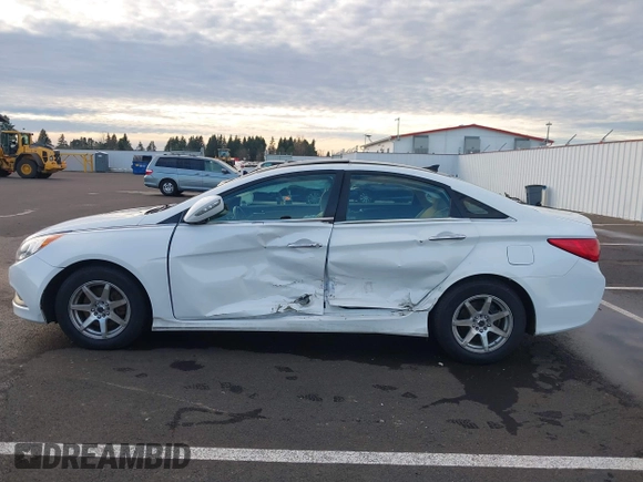 2014 Hyundai Sonata SE with VIN 5NPEC4AC5EH880717, listed as a IAAI auction lot 41275243 with 145,577 mi miles and . Bid and sale history available at DreamBid. Image 14.