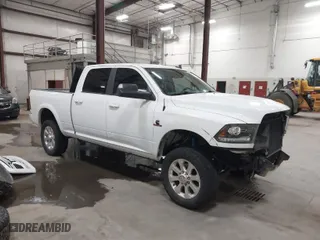 2018 Ram 2500 Laramie with VIN 3C6UR5FL1JG213467, listed as a IAAI auction lot 41513596 with 100,855 mi miles. Bid and sale history available at carsss.com. Image 1.