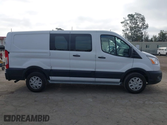 2021 Ford Transit Cargo with VIN 1FTBR1Y85MKA69355, listed as a IAAI auction lot 42544780 with 33,288 mi miles and . Bid and sale history available at DreamBid. Image 13.