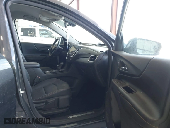 2021 Chevrolet Equinox Premier z VIN 2GNAXNEV9M6140537, wystawiony jako IAAI lot #42016514 z przebiegiem 52 237 mil mil oraz . Historia ofert i sprzedaży dostępna na DreamBid. Obrazek 5.
