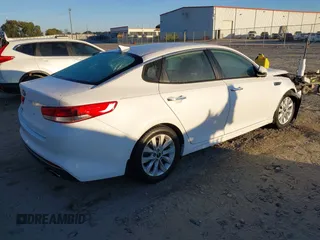 2018 Kia Optima LX with VIN 5XXGT4L32JG265716, listed as a IAAI auction lot 40645411 with 112,305 mi miles and . Bid and sale history available at DreamBid. Image 4.
