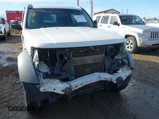 2008 Dodge Nitro SXT with VIN 1D8GU28K18W113714, listed as a IAAI auction lot 41671938 with 118,629 mi miles. Bid and sale history available at carsss.com. Image 6.
