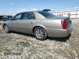 2002 Cadillac DeVille DHS z VIN 1G6KE57Y32U107755, wystawiony jako Copart lot #52811235 z przebiegiem 111 141 mil mil oraz Nie do naprawy. Historia ofert i sprzedaży dostępna na DreamBid. Obrazek 2.