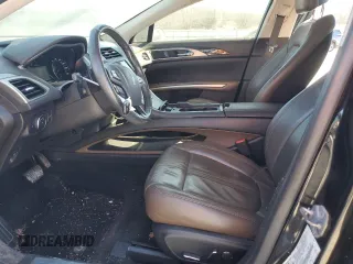 2014 Lincoln MKZ z VIN 3LN6L2GK0ER802765, wystawiony jako Copart lot #46603025 z przebiegiem 114 201 mil mil oraz Szkoda całkowita • Salvage title. Historia ofert i sprzedaży dostępna na DreamBid. Obrazek 7.