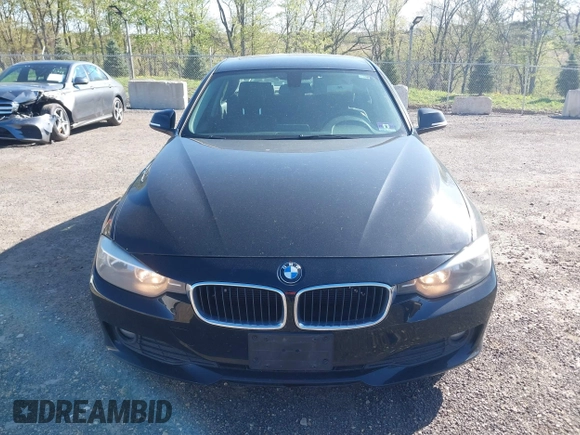 2015 BMW 3 Series 320i with VIN WBA3B1G55FNT04870, listed as a IAAI auction lot 42141211 with 249,720 mi miles. Bid and sale history available at carsss.com. Image 6.