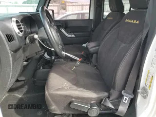 2014 Jeep Wrangler Unlimited Sahara z VIN 1C4BJWEG9EL102336, wystawiony jako Copart lot #55391335 z przebiegiem Nie podano mil oraz Szkoda całkowita • Salvage title. Historia ofert i sprzedaży dostępna na DreamBid. Obrazek 7.