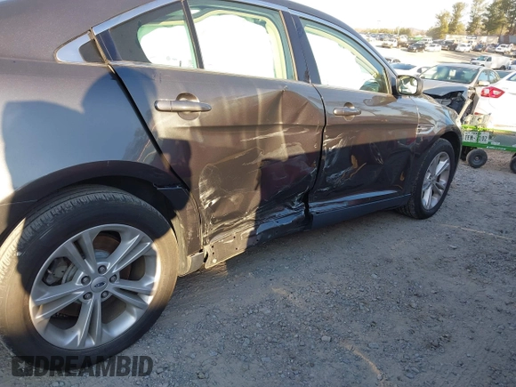 2017 Ford Taurus SE with VIN 1FAHP2D8XHG115594, listed as a IAAI auction lot 41237325 with 77,945 mi miles and . Bid and sale history available at DreamBid. Image 6.