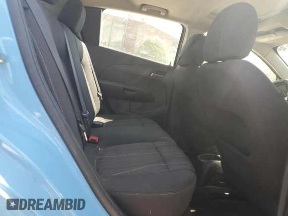 2014 Chevrolet Sonic LT with VIN 1G1JC6SBXE4155113, listed as a Copart auction lot 60866464 with 99,695 mi miles and Salvage Title. Bid and sale history available at carsss.com. Image 10.