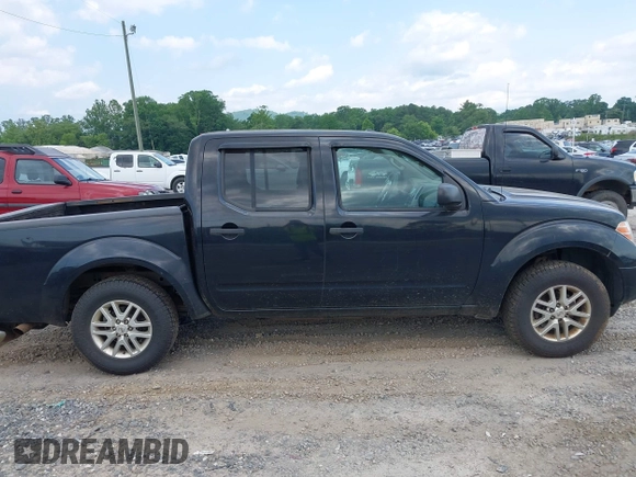 2015 Nissan Frontier S with VIN 1N6AD0EV2FN735908, listed as a IAAI auction lot 42388456 with 164,889 mi miles and . Bid and sale history available at DreamBid. Image 13.