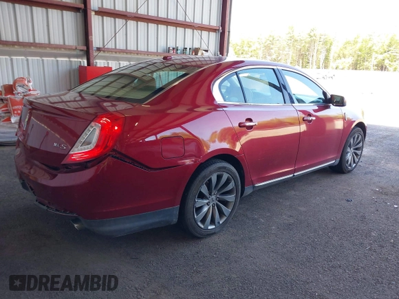 2014 Lincoln MKS z VIN 1LNHL9DK0EG606497, wystawiony jako IAAI lot #42279603 z przebiegiem 129 972 mil mil oraz . Historia ofert i sprzedaży dostępna na DreamBid. Obrazek 4.