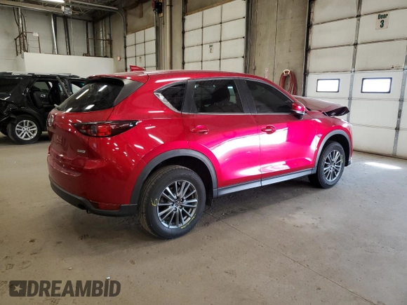 2017 Mazda CX-5 Touring with VIN JM3KFACL5H0176922, listed as a Copart auction lot 53250515 with 69,261 mi miles and Salvage Title. Bid and sale history available at carsss.com. Image 3.