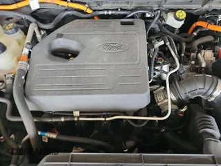 2020 Ford Escape Titanium Hybrid with VIN 1FMCU0DZ2LUB82013, listed as a IAAI auction lot 42727391 with 92,623 mi miles and . Bid and sale history available at DreamBid. Image 13.