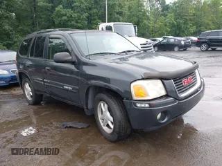 2004 GMC Envoy SLE with VIN 1GKDT13S142249370, listed as a IAAI auction lot 42623083 with 121,033 mi miles and . Bid and sale history available at DreamBid. Image 1.