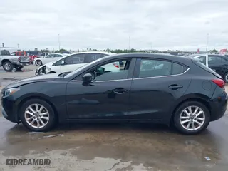 2016 Mazda Mazda3 i Grand Touring with VIN 3MZBM1N75GM267972, listed as a IAAI auction lot 41030060 with 86,065 mi miles. Bid and sale history available at carsss.com. Image 14.