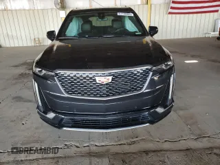 2020 Cadillac XT6 FWD Premium Luxury with VIN 1GYKPCRS8LZ149860, listed as a Copart auction lot 61108985 with 58,459 mi miles and Salvage title. Bid and sale history available at DreamBid. Image 5.
