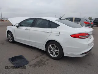 2018 Ford Fusion SE z VIN 3FA6P0H73JR212616, wystawiony jako IAAI lot #40869945 z przebiegiem 142 355 mil mil oraz . Historia ofert i sprzedaży dostępna na DreamBid. Obrazek 3.