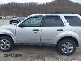 2012 Ford Escape XLT with VIN 1FMCU9DG1CKB76704, listed as a IAAI auction lot 41863525 with 176,104 mi miles and . Bid and sale history available at DreamBid. Image 14.