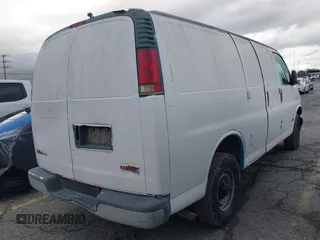 2002 GMC Savana z VIN 1GTHG35F021200273, wystawiony jako IAAI lot #41600511 z przebiegiem 230 052 mil mil oraz . Historia ofert i sprzedaży dostępna na DreamBid. Obrazek 4.