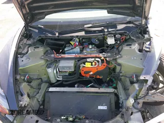 2023 Tesla Model 3 with VIN 5YJ3E1EAXPF652089, listed as a IAAI auction lot 42666520 with 17,679 mi miles and . Bid and sale history available at DreamBid. Image 10.
