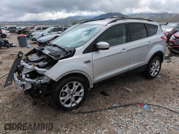 2016 Ford Escape SE z VIN 1FMCU0G91GUC59990, wystawiony jako Copart lot #56956395 z przebiegiem 112 706 mil mil oraz Szkoda całkowita • Salvage title. Historia ofert i sprzedaży dostępna na DreamBid. Obrazek 1.