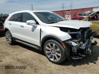 2020 Cadillac XT4 AWD Premium Luxury with VIN 1GYFZDR44LF143798, listed as a Copart auction lot 56134875 with 31,365 mi miles and Salvage title. Bid and sale history available at DreamBid. Image 4.