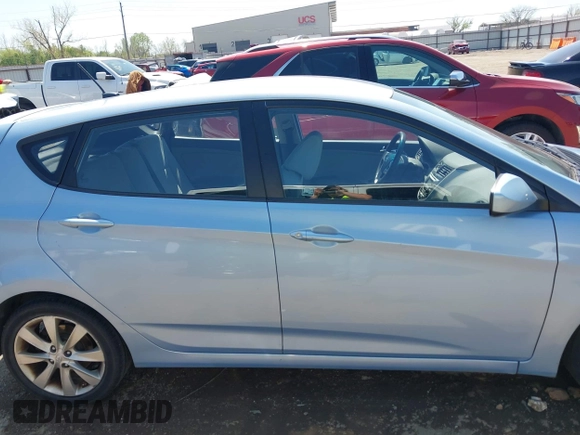 2012 Hyundai Accent SE with VIN KMHCU5AE0CU022050, listed as a IAAI auction lot 41955452 with 140,460 mi miles. Bid and sale history available at carsss.com. Image 13.