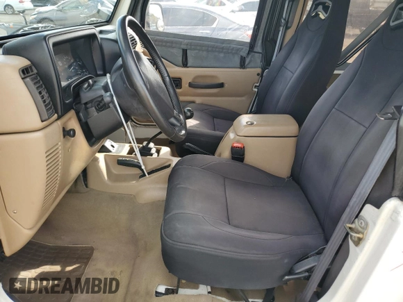 1999 Jeep Wrangler Sahara with VIN 1J4FY49SXXP414414, listed as a Copart auction lot 41643665 with 154,810 mi miles and Salvage Title. Bid and sale history available at carsss.com. Image 7.