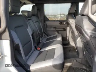 2024 Ford Bronco Big Bend с VIN 1FMDE7BH4RLB08451, выставлен на аукционе Copart как лот 49607475 с пробегом 3 569 миль миль и Списание • Salvage title. История ставок и продаж доступна на DreamBid. Изображение 11.