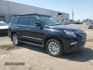 2014 Lexus GX with VIN JTJBM7FXXE5086922, listed as a Copart auction lot 53870665 with 142,608 mi miles and Salvage Title. Bid and sale history available at carsss.com. Image 4.