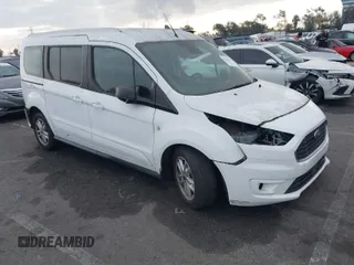 2019 Ford Transit Connect XLT with VIN NM0GE9F27K1390554, listed as a IAAI auction lot 41441827 with 101,083 mi miles and . Bid and sale history available at DreamBid. Image 1.