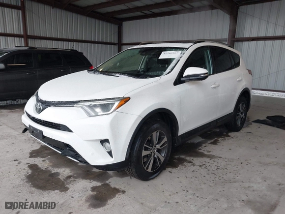 2018 Toyota RAV4 XLE with VIN JTMRFREV6JD222115, listed as a IAAI auction lot 41505367 with 118,126 mi miles. Bid and sale history available at carsss.com. Image 17.