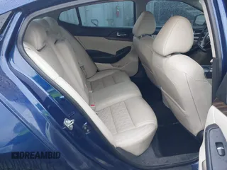 2016 Nissan Maxima SL with VIN 1N4AA6APXGC396890, listed as a IAAI auction lot 41594044 with 144,164 mi miles and . Bid and sale history available at DreamBid. Image 8.