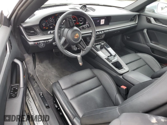 2020 Porsche 911 Carrera S z VIN WP0CB2A96LS263554, wystawiony jako Copart lot #52013384 z przebiegiem 8 702 mil mil oraz . Historia ofert i sprzedaży dostępna na DreamBid. Obrazek 8.