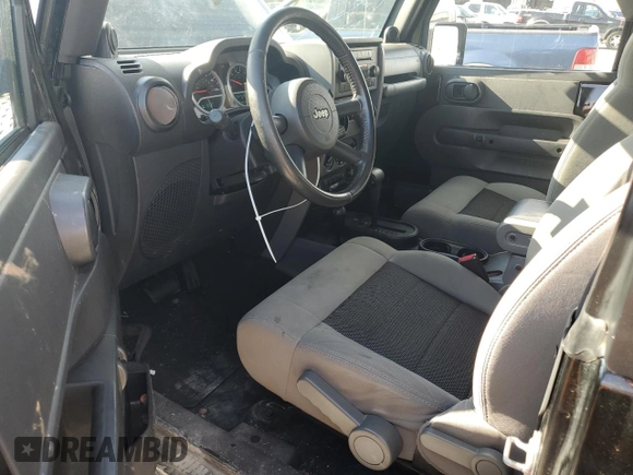 2010 Jeep Wrangler Rubicon with VIN 1J4BA6D10AL109001, listed as a Copart auction lot 69453954 with 137,821 mi miles and Salvage title. Bid and sale history available at DreamBid. Image 8.