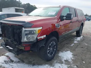 2016 Nissan Titan XD PRO-4X with VIN 1N6BA1F47GN515917, listed as a IAAI auction lot 41355875 with 95,793 mi miles. Bid and sale history available at carsss.com. Image 2.