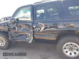 2002 GMC Yukon SLT with VIN 1GKEC13T92R162978, listed as a IAAI auction lot 41851599 with 213,789 mi miles. Bid and sale history available at carsss.com. Image 14.