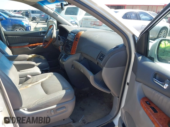 2006 Toyota Sienna XLE with VIN 5TDZA22C06S504271, listed as a IAAI auction lot 41573903 with 208,712 mi miles. Bid and sale history available at carsss.com. Image 5.