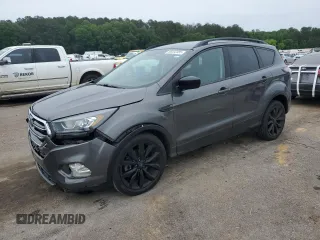 2017 Ford Escape SE z VIN 1FMCU9GD1HUB35003, wystawiony jako Copart lot #56502385 z przebiegiem 74 409 mil mil oraz Szkoda całkowita • Salvage title. Historia ofert i sprzedaży dostępna na DreamBid. Obrazek 1.