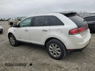 2009 Lincoln MKX with VIN 2LMDU68C79BJ12359, listed as a Copart auction lot 81906694 with 215,549 mi miles and Salvage Title. Bid and sale history available at DreamBid. Image 2.