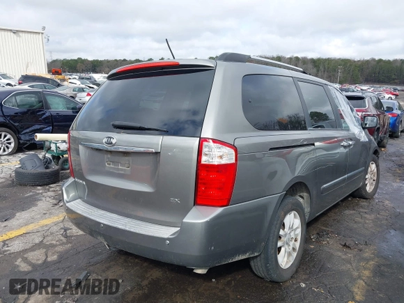 2010 Kia Sedona EX with VIN KNDMH4C33A6342127, listed as a IAAI auction lot 41570657 with 249,395 mi miles. Bid and sale history available at carsss.com. Image 4.