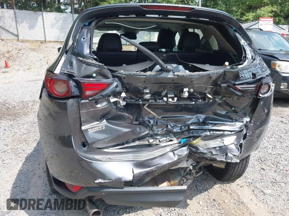 2020 Mazda CX-5 Grand Touring with VIN JM3KFBDM1L0821975, listed as a IAAI auction lot 40088794 with 68,895 mi miles and . Bid and sale history available at DreamBid. Image 20.