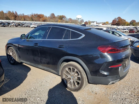2021 BMW X6 xDrive40i with VIN 5UXCY6C07M9D94944, listed as a Copart auction lot 77106334 with 52,106 mi miles and Salvage Title. Bid and sale history available at carsss.com. Image 2.