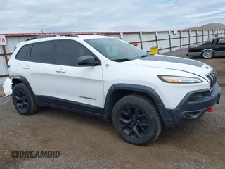 2017 Jeep Cherokee Trailhawk z VIN 1C4PJMBS7HW538219, wystawiony jako IAAI lot #42337681 z przebiegiem 168 734 mil mil oraz . Historia ofert i sprzedaży dostępna na DreamBid. Obrazek 1.