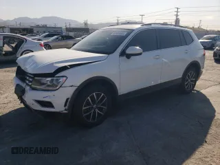 2020 Volkswagen Tiguan SE z VIN 3VV3B7AX6LM107732, wystawiony jako Copart lot #52038695 z przebiegiem 27 317 mil mil oraz Szkoda całkowita • Salvage title. Historia ofert i sprzedaży dostępna na DreamBid. Obrazek 1.